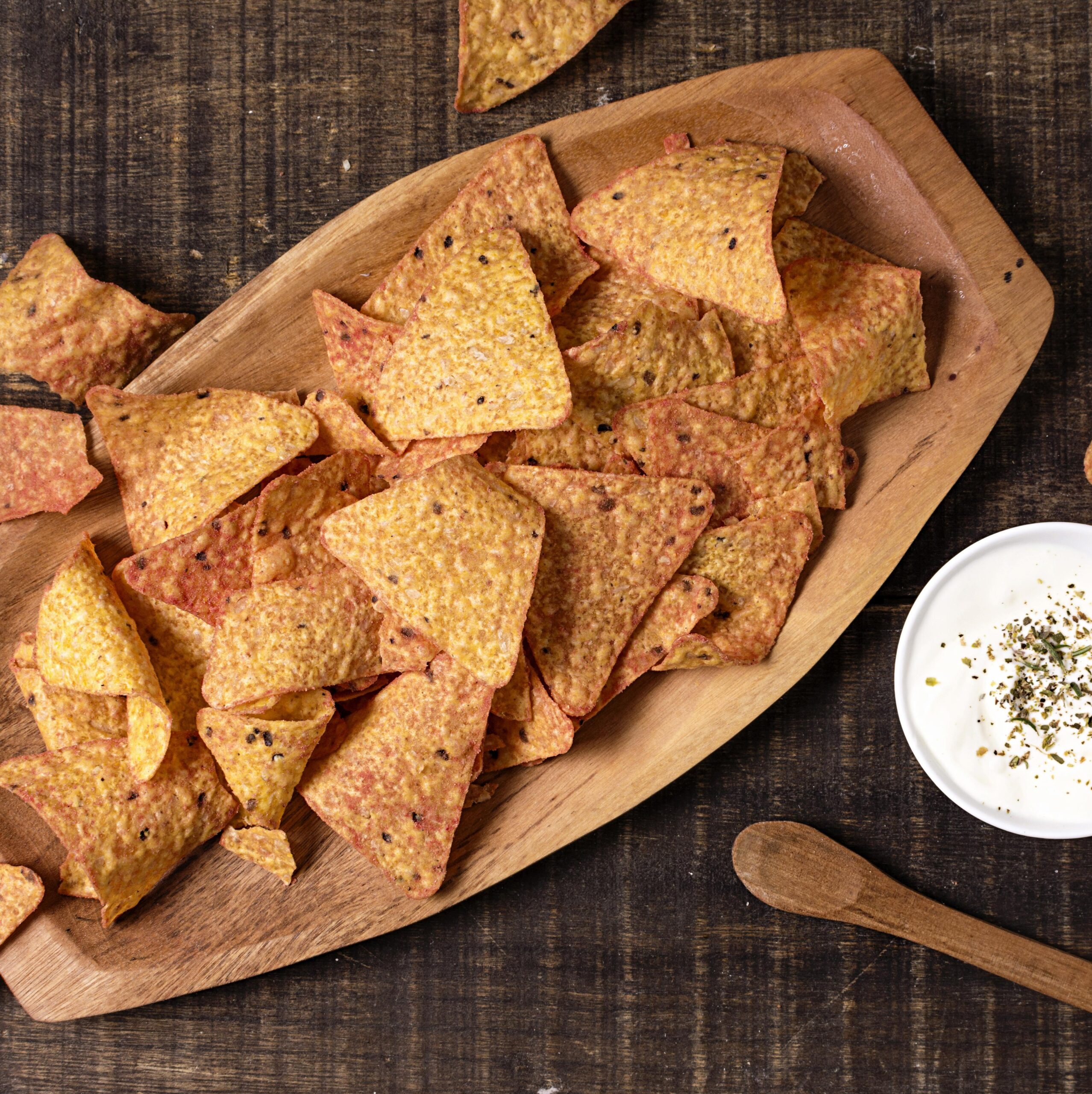 top-view-nacho-chips-with-sauce